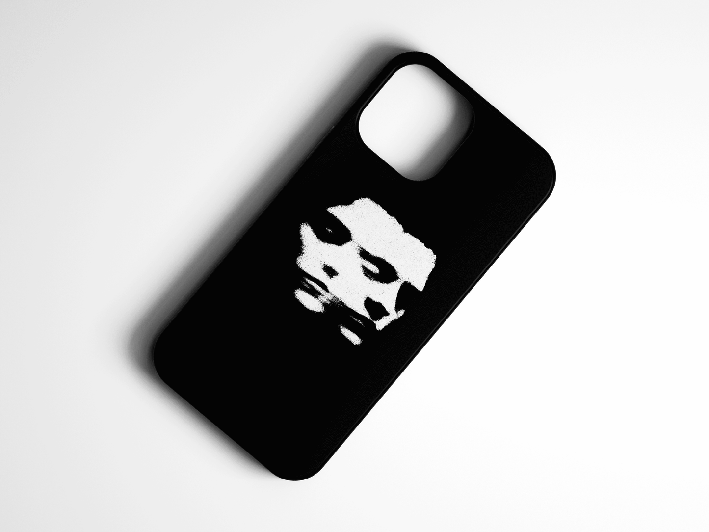 Siyah zeminli, beyaz yüz figürlü şık telefon kılıfı, modern tasarım aksesuar