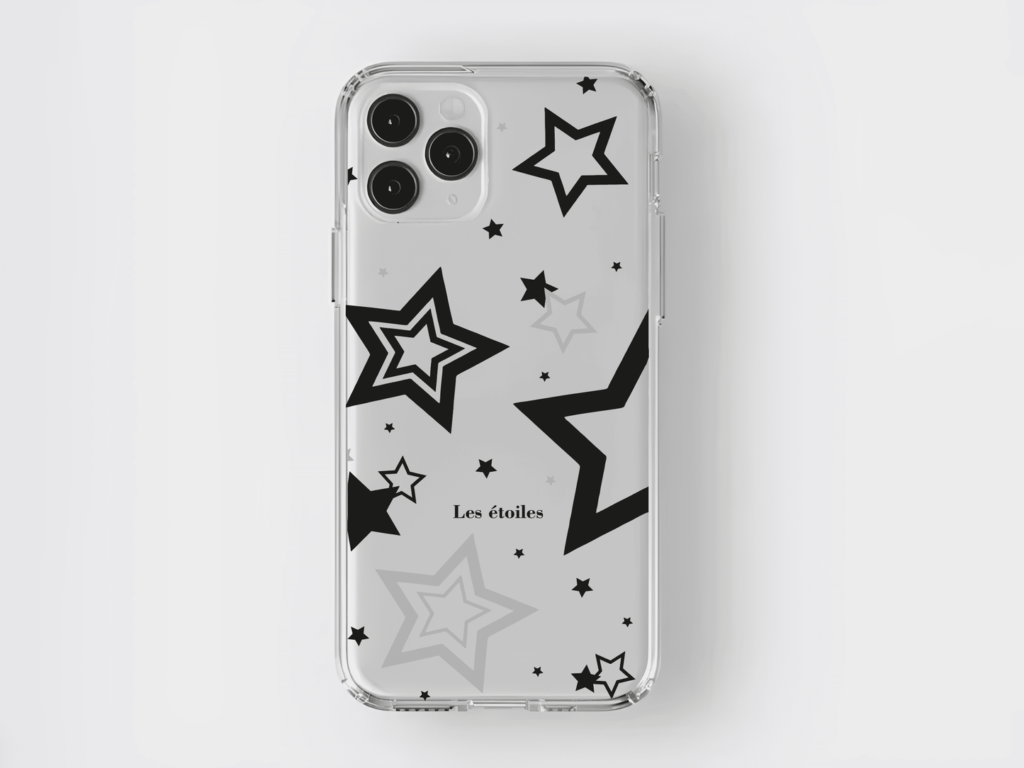 Siyah ve gri yıldız desenli, şeffaf iPhone telefon kılıfı, modern tasarım