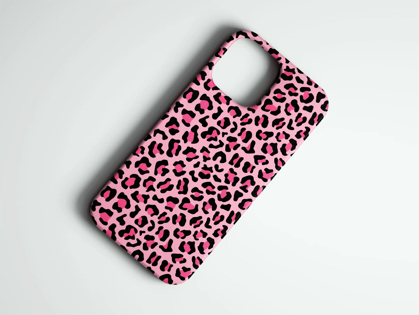 Pembe ve siyah leopar desenli telefon kılıfı, şık ve koruyucu tasarım