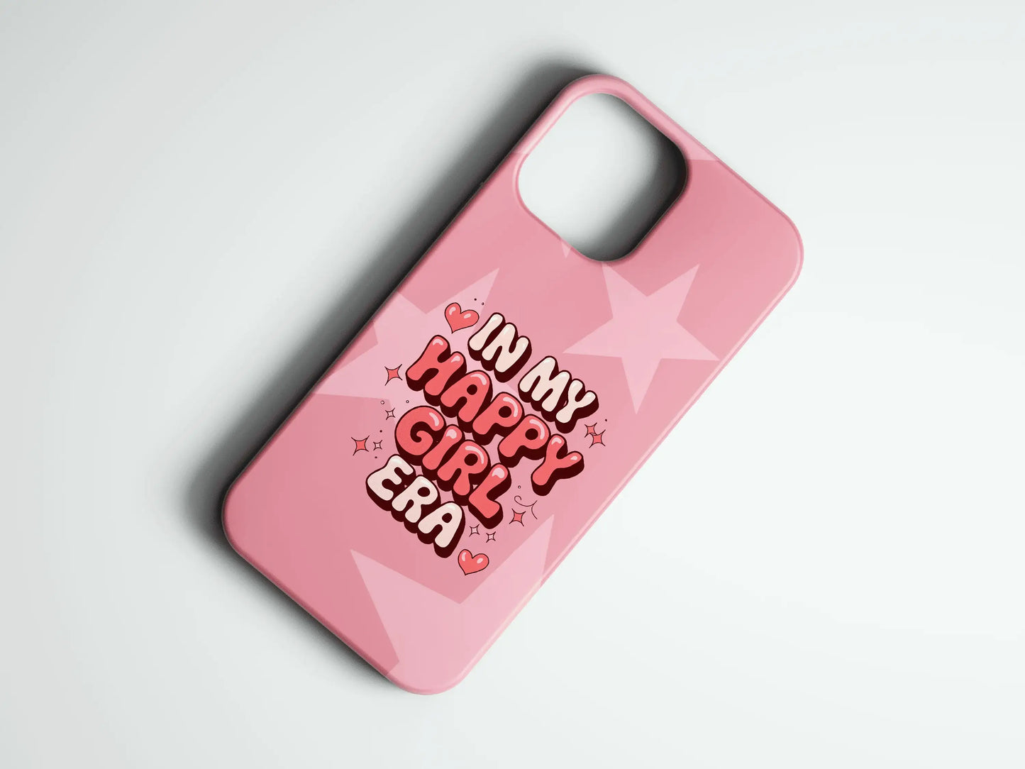 Pembe yıldız desenli, "In My Happy Girl Era" yazılı telefon kılıfı