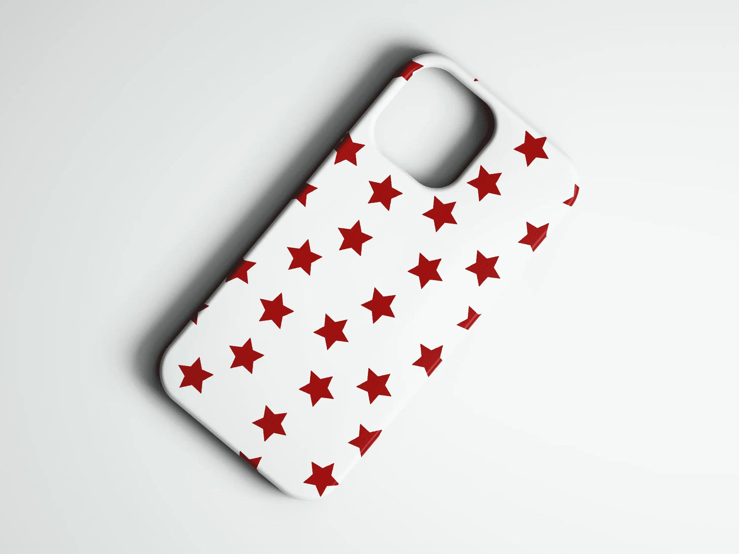 Kırmızı yıldız desenli beyaz telefon kılıfı, modern ve şık tasarım